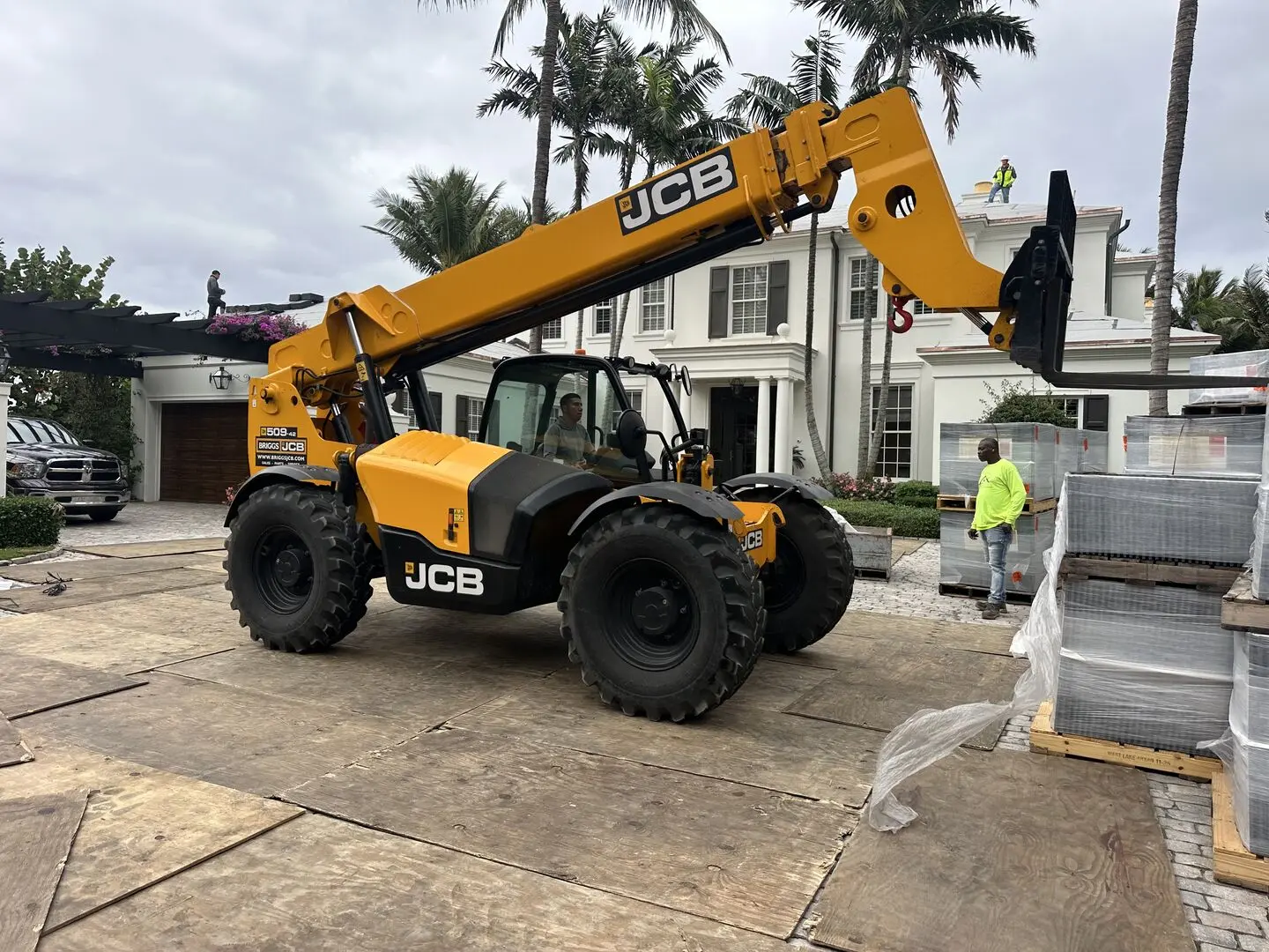 MMJ telehandler and pallets prepared for roof tile loading