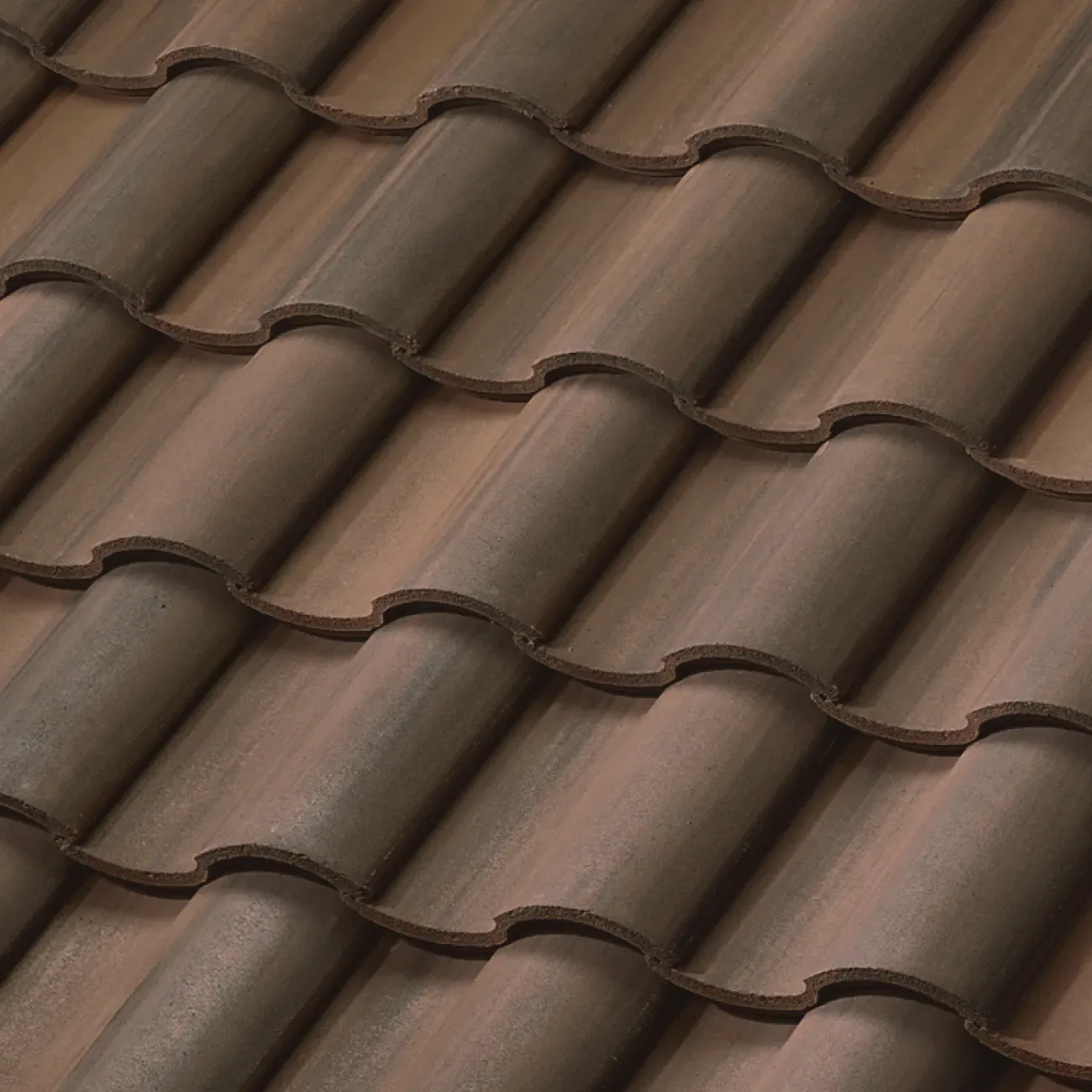 Manufacturer reference image of brown Barcelona 900 concrete roof tile in the Chestnut Burnt finish